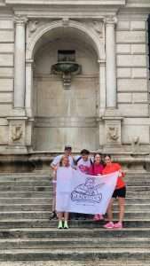 group picture komen race at the fountain of piazza trilussa 2026